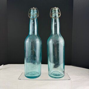 Vintage AB CO Aqua Bale Top Bottles Set Of 2